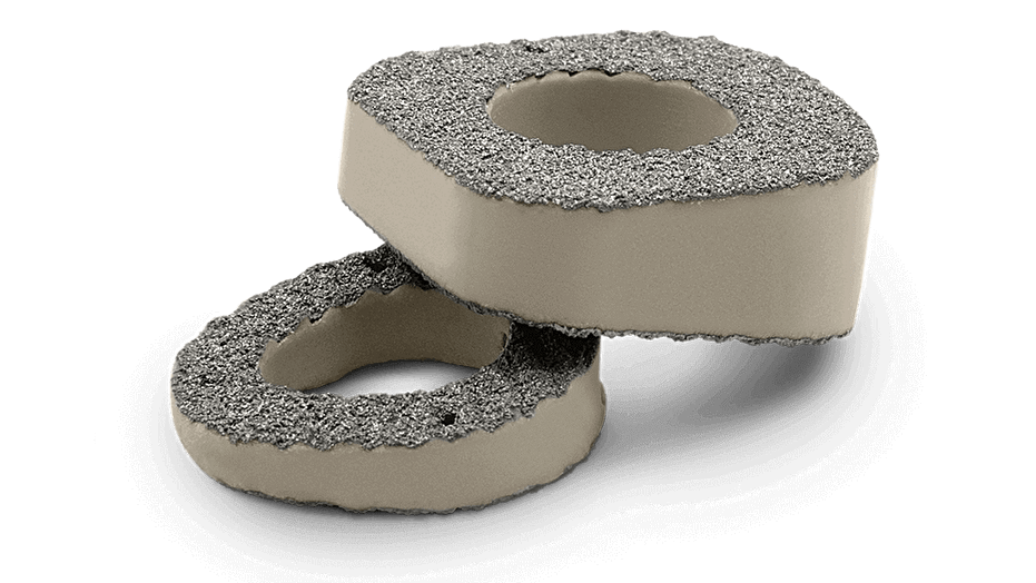 Both Evans and Cotton Procedure-specific TiPEEK Foot Osteotomy Wedges shown on top of each other 