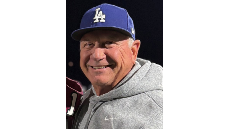 Photo of Rudy Kadlub wearing a  blue cap