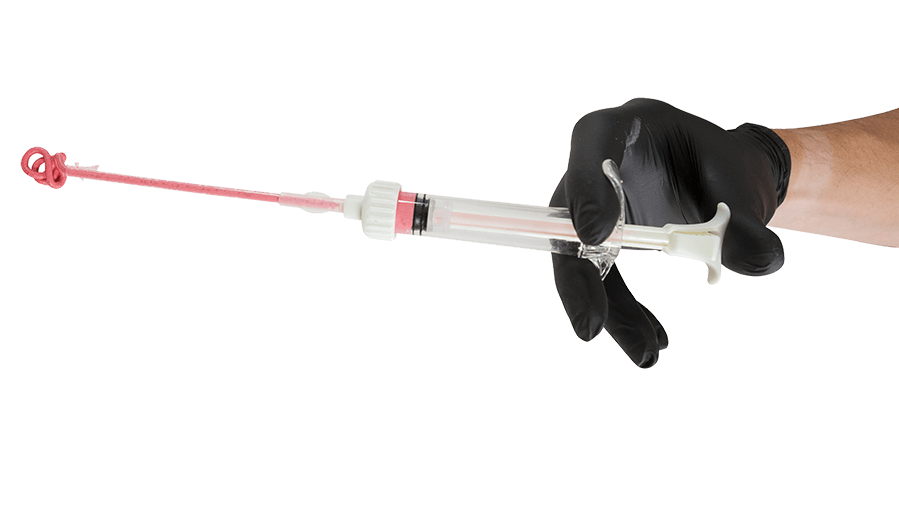 Drillable Bone Void Filler being injected from syringe