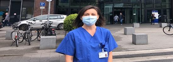 female doctor wearing a mask outside