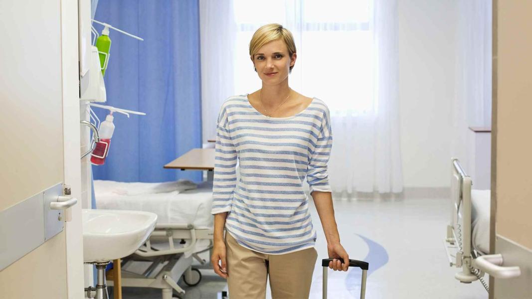 Patient leaves hospital room